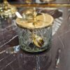 SUGGESTED SUGGESTER with gold spoon in nickel-glamour