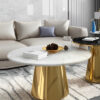 Gold round coffee table for dining room, modern fashionable base shape, white marble top, glamour