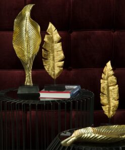 ELIOT gold leaf-shaped figurine, glamour style, beautiful