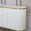 white chest of drawers, fluted, gold elements, glamour style, beautiful