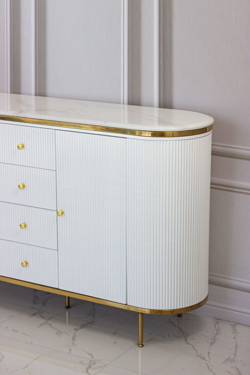 white chest of drawers, fluted, gold elements, glamour style, beautiful