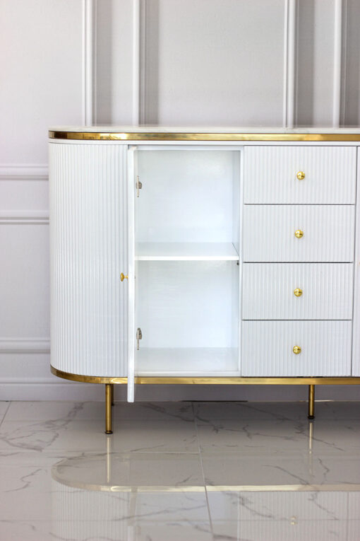 white chest of drawers, fluted, gold elements, glamour style, unique