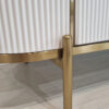 white chest of drawers, fluted front, stone sintered top, gold elements, for living room