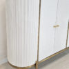 white chest of drawers, fluted front, sintered stone top, gold elements, beautiful