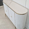 white chest of drawers, fluted front, stone sintered top, golden elements, unique