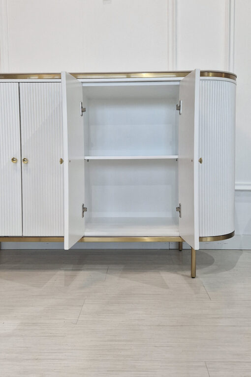 white chest of drawers, fluted front, sintered stone top, golden elements, sophisticated