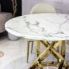 Dining table round, on gold metal base, white top imitating marble, modern, design