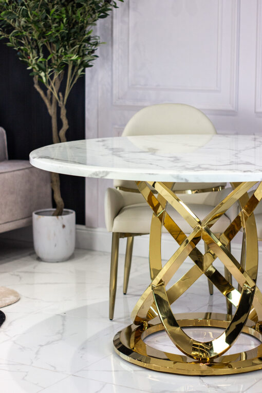 Round dining table, on a gold metal base, white top imitating marble, modern, elegant