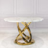 Dining table round, on a gold metal base, white top imitating marble, modern, elegant