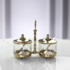 SET-2-CUICERIES-glass-on-gold-metal-stand-glamour-style-exceptional-510x340