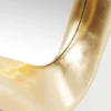WALL LIRROR of irregular shape, gold frame, glamour style, decorative