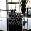 VASON CONTAINER in ceramic, geometric black and white pattern, copper details