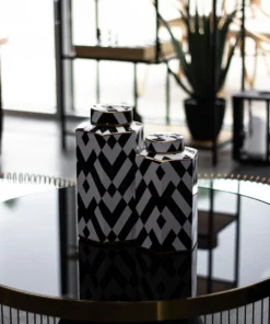 VASON CONTAINER in ceramic, geometric black and white pattern, copper details