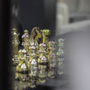 Chess pieces in elegant style, gold and black pawns, decorative, exclusive