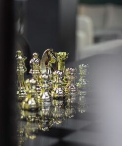 Chess pieces in elegant style, gold and black pawns, decorative, exclusive