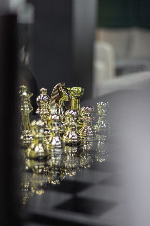 Chess pieces in elegant style, gold and black pawns, decorative, exclusive