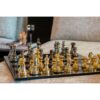 Chess pieces in elegant style, gold and black pawns, decorative, glamorous