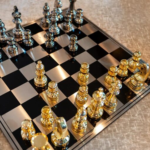 Chess pieces in elegant style, gold and black pawns, decorative, unique