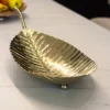 PATTERN of gold in the shape of a large leaf, beautiful texture, glamour style