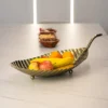 PATTERN of gold in the shape of a large leaf, beautiful texture, glamorous style, unique