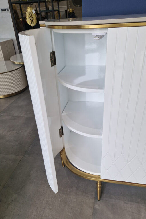 white chest of drawers, fluted with gold metal details, sintered stone top, glamorous, exclusive