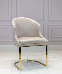 Upholstered chair, velour fabric, golden legs, glamour style, cream-colored