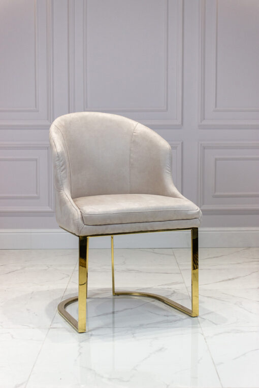 Upholstered chair, velour fabric, golden legs, glamour style, cream-colored