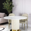 Round dining table, light beige, fluted base, gold metal details, modern