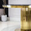 Round dining table on gold designer base, black imitation marble top, glamour, exclusive