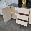 Cashmere dresser, gold metal details, fluted body, black top, modern, unique