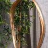 WALL MIRROR oval, gold frame with irregular shape, designer style