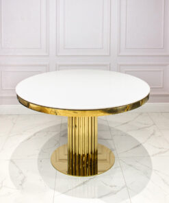 Round dining table on gold designer base, white imitation marble top, glamour