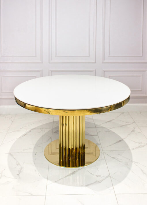 Round dining table on gold designer base, white imitation marble top, glamour