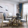 Dining table round, on gold metal base, black imitation marble top, modern