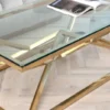 Coffee TABLE on gold decorative frame, transparent top, New York glamour, for living room