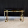 CONSOLA on gold frame with black imitation marble top, modern glamour