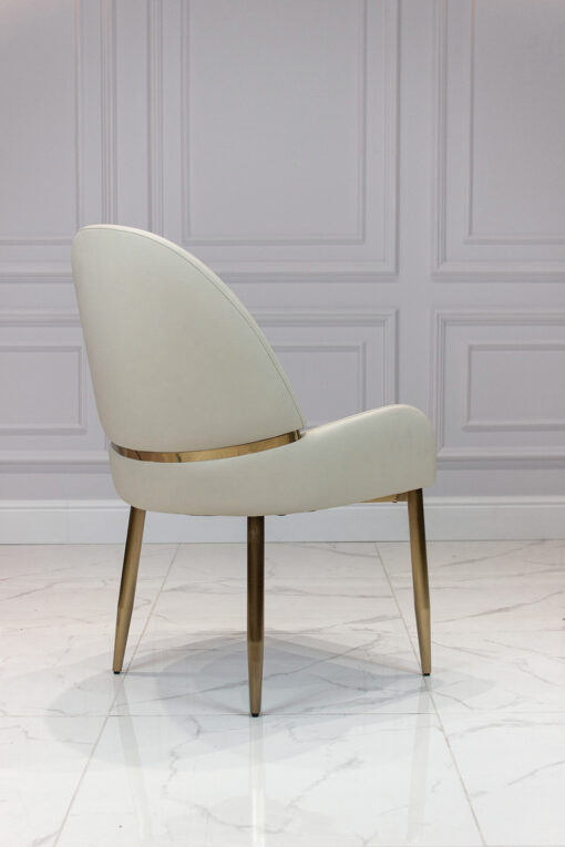 Dining chair on a gold frame, contoured white eco leather seat, modern style, beautiful