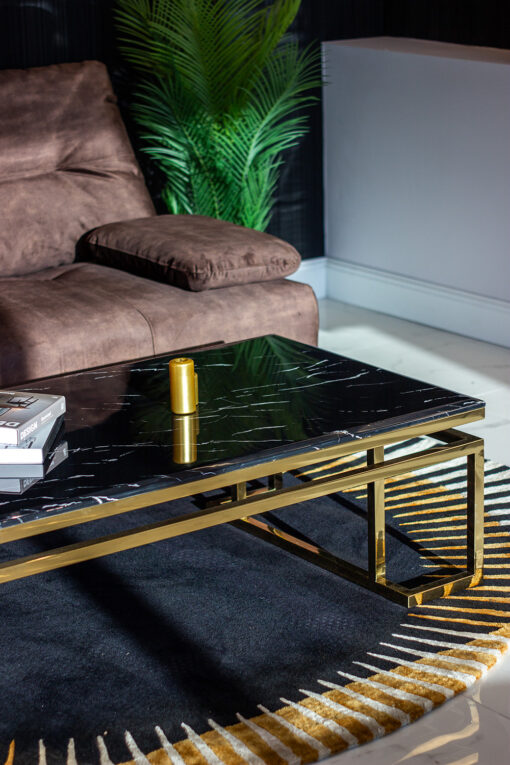 Rectangular coffee table on gold glossy frame, black imitation marble top, modern style