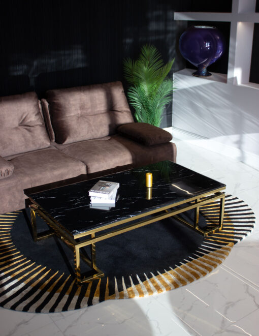 Rectangular coffee table on gold shiny frame, black imitation marble top, modern style, beautiful