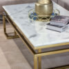 Rectangular coffee table on gold shiny frame, white top imitating marble, modern style, unique