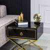 NIGHT CUPBOARD with black body on gold metal legs in modern style