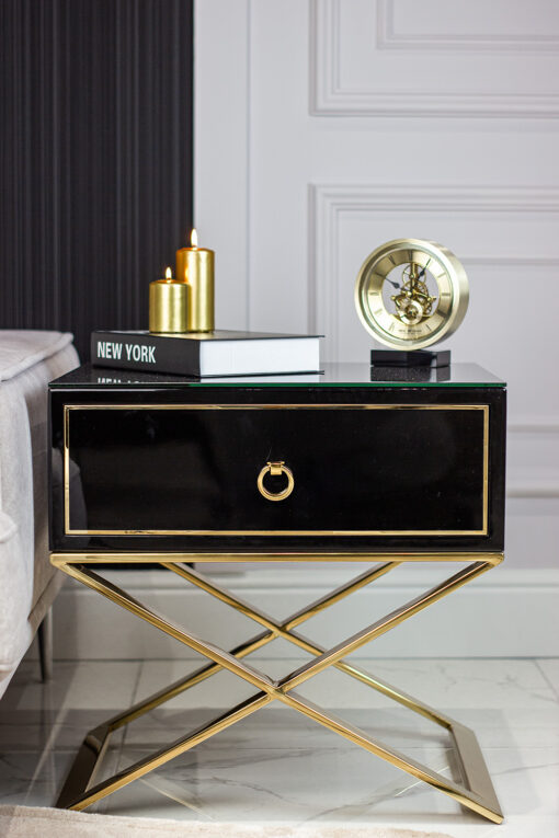 NIGHT CUPBOARD with black body on gold metal legs in modern style, exclusive