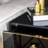 NIGHT CUPBOARD with black body on gold metal legs in modern style, unique