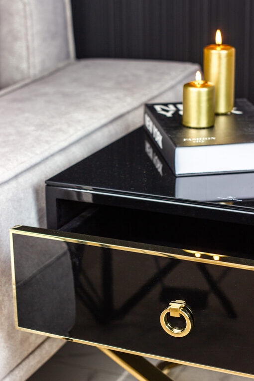 NIGHT CUPBOARD with black body on gold metal legs in modern style, unique