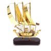 DECORATIVE FIGURE brass three-masted ship on wooden base, modern